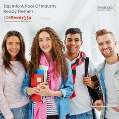 a group of young people standing next to each other holding books and smiling at the camera