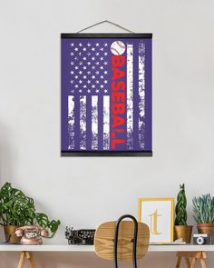 an american flag with the word baseball on it hangs above a desk in a home office