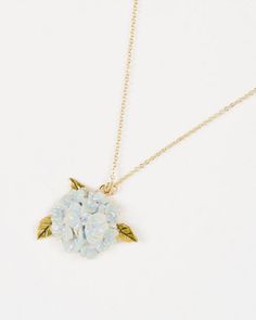 Our Hydrangea charm hangs gently from a simple charm. An icon of the British horticultural world, the hydrangea is a staple of the British cottage garden. This piece makes an ideal gift for a green-fingered friend or the perfect treat for yourself! Key features: Hand-painted enamel Hand-carved detailing 18k gold-plated Hydrangea Necklace, Fable England, British Cottage, Gift Wishlist, Mom Clothes, British Garden, Small Scarf, Cotton Pouch, Random Aesthetics