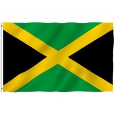 the flag of jamaica is flying in the wind with black and yellow stripes on it