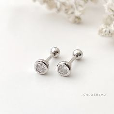 ♡4mm CZ ball Sterling silver Screw back earrings♡ D E T A I L S Metal Material: Solid Sterling Silver Face Size: 4mm perimeter Cubic Zirconia Pin thickness: 0.8mm(20g) Back screw ball size: 2.5mm Total length: 12mm Features: - ⚠️ This earring is sold as a single piece, not a pair ⚠️ - Perfect for everywhere on-ear including cartilage, earlobe, and tragus - Chic and modern design - Perfect gift - Finest quality materials - All components are 100% sterling silver CARE TIPS: Following these easy steps, to keep your jewelry in its original condition for a long time: I use a chain with anti-tarnish finishing for my plated jewelry. However, it is absolutely normal that plated jewelry will lose its original color over time. Please follow these simple care instructions to keep it beautiful, shiny, Stud Earrings Silver, Henderson Nv, Classic Jewelry, Screw Back Earrings, Polish Jewelry, Tragus, Earrings Sterling Silver, Metal Material, Silver Earrings Studs