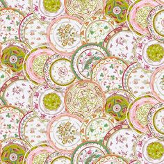 an image of colorful circles and flowers on white fabric with pink, green, yellow and red colors