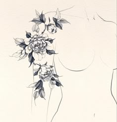 a black and white drawing of flowers on a woman's back