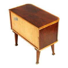 a small wooden table with two legs and a drawer on one side, in the shape of a chest