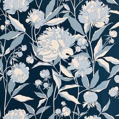 a blue and white flowered wallpaper with many flowers on the top of it