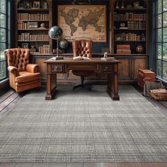 an office with leather chairs and a map on the wall