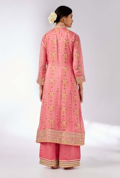 Elevate your style with this delicately embroidered ensemble that adds shimmer and richness. The long-sleeved, front-open kurta in luxurious cotton silk pairs beautifully with linen satin palazzo pants and a sheer net dupatta. Easy to carry and perfect for any occasion, this set effortlessly blends elegance with versatility. Satin Palazzo Pants, Kurta And Palazzo, Pink Kurta, Indian Arts And Crafts, Palazzo Set, Indian Textiles, Net Dupatta, Palazzo Pants, Traditional Techniques