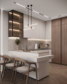 a modern kitchen with white counter tops and wooden chairs in front of an island that has stools on it