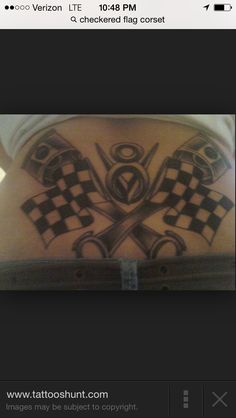 a person with a checkered tattoo on their stomach