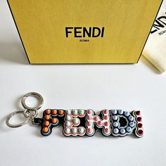 Authentic New Unused Fendi Bag Charm/Key Ring. Includes Box And Dustbag. - 5.25"W X 1.5"H Fendi Bag Charm, Fendi Strap, Fendi Bag, Fendi Accessories, Studded Bag, Bag Charms, Ring Color, Angelina Jolie, Key Rings