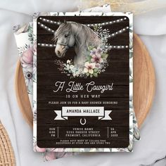 this is an image of a horse and flowers baby shower or bridal party card