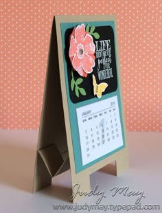 an easel card with a calendar on it