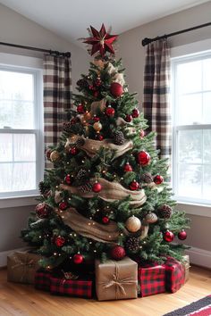 a decorated christmas tree with presents under it