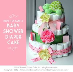 a baby shower diaper cake with pink flowers and green teddy bears on the top