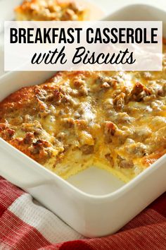 breakfast casserole with biscuits in a white dish