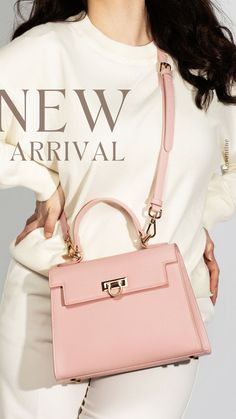 The stunning new Layla satchel in Pink is the perfect addition to your Spring outfits. Available in 8 colours. A fab work bag for women, birthday gift idea for her or a treat just for you. Big enough to carry all your handbag essentials. Wear crossbody, over shoulder or carry along. Bring the Spring aesthetic and pair with white jeans for the ultimate look! Grab yours now! Luxury Spring Bag With Top Carry Handle, Chic Flap Bag With Removable Pouch For Daily Use, Elegant Handheld Bucket Bag For On-the-go, Elegant Leather Bags For Spring, Pink Top Handle Bucket Bag For Shopping, Chic Pink Bucket Bag For Shopping, Chic Bucket Bag With Adjustable Handle, Luxury Spring Satchel Shoulder Bag, Luxury Spring Shoulder Satchel