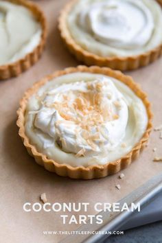 coconut cream tarts on a baking sheet