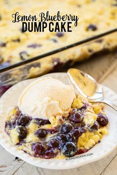 lemon blueberry dump cake on a plate with ice cream