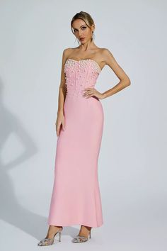 Pink Evening Dress With Fitted Bodice For Banquet, Pink Embellished Banquet Dress, Pink Evening Dresses With Pearl Embroidery, Beaded Sleeveless Dress With Fitted Bodice, Sleeveless Beaded Dress With Fitted Bodice, Pink Embellished Gown With Sweetheart Neckline, Embellished Pink Gown With Sweetheart Neckline, Sleeveless Beaded Prom Gown, Sleeveless Beaded Gown For Prom Season