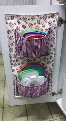 the kitchen cabinet door is filled with colorful dishes