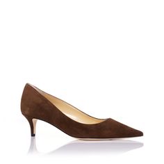 Reintroducing a timeless staple, the Classic Pump in chocolate. This chocolate pump is made from luxurious suede that emphasizes elegance in a classic design. A nearly 2-inch (45mm) pump gives this high heel just enough lift.Handcrafted with exquisite attention to detail from fine suede, this shoe emphasizes comfort with our patented Triple I ™ signature invisible insole, designed by Marion Parke, a licensed Podiatrist. The suede will conform to your foot the more you wear it, which makes this s Comfortable Pumps, Color Chocolate, Classic Pumps, Red Suede, Work Wardrobe, Black Glitter, High Heel Pumps, Soft Suede, Edgy Fashion