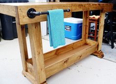 a wooden table with a blue towel on it