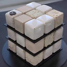 there is a cake made to look like cubes on top of eachother