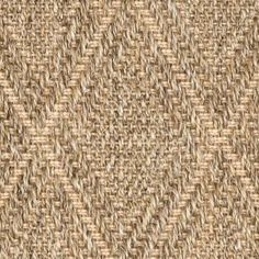 a close up view of the texture of a woven fabric with brown and beige colors