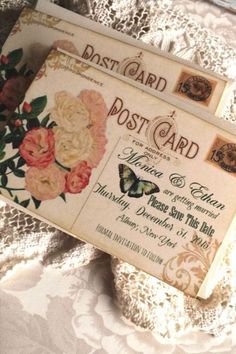 an old fashioned postcard is laying on a lace doily with flowers and butterflies