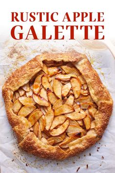 an apple pie on top of a piece of parchment paper with the words rustic apple galette