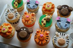 there are many cupcakes that have animals on them