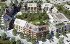 an aerial view of several buildings and trees