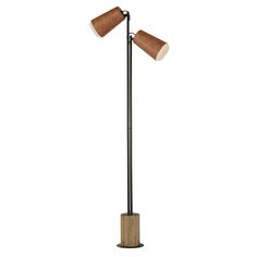 two light floor lamp with wooden base and brown shades on the lamps are both turned on