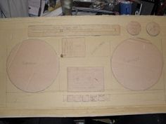 a cardboard cut out of a stereo system