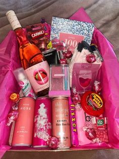 a pink box filled with lots of different types of items