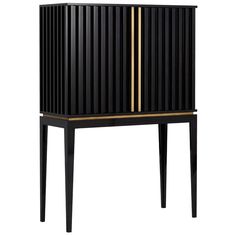 a black cabinet with gold stripes on it