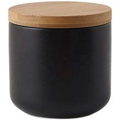 a black container with a wooden lid on a white background and a wood top in the shape of a round