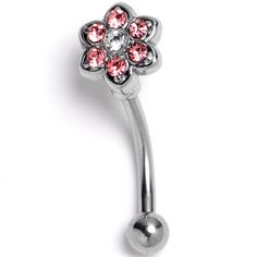 a silver belly ring with pink crystal flowers on the end and a metal ball attached to it