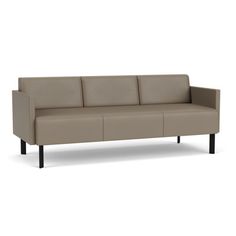 a beige leather couch with black legs