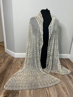 This stunning Egyptian Vintage Assuit shawl is from between the 1920 's to 1930's. It is a cream colored shawl that is in perfect condition. This shawl is 25 inches wide by 85 inches long. Please reach out with any questions, I am open to offers! Cream One-size Shawl Scarves, Cream Shawl Scarf One Size, Fitted Vintage Shawl, Elegant Cream Shawl Dupatta, Fitted Vintage Shawl For Wedding, Vintage Fitted Shawl For Wedding, Beige Shawl Dupatta, Beige Dupatta Scarf Shawl, White Vintage Shawl Scarf