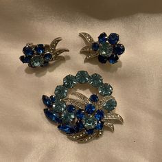 Beautiful Vintage Silver Tone Eisenberg Ice, Light Blue, Dark Blue And Clear Crystal Brooch. Signed On Back With A C-Clasp Closure. Clip-On Earrings With Same Colors And Design, Also Signed. Vintage Jewelry Sets Are Hard To Find. Excellent Vintage Condition From An Estate. Vintage Items Will Not Appear Brand New. My Pieces Are All Lovingly Used. All Items Are Described To The Best Of My Ability. Please Look At The Photos; They Are The Exact Item You Are Purchasing And Part Of The Description. I Ice Jewelry, Vintage Jewelry Sets, Crystal Brooch, Blue Dark, Blue Crystals, Ice Blue, Clear Crystal, Blue And Silver, Vintage Silver