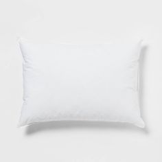 a white pillow on a white background