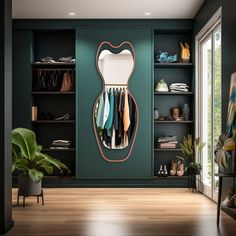 a closet with green walls and wooden flooring