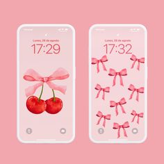 two iphones with bows and cherries on them, one is displaying the time