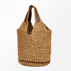 Complete your summer ensemble with our Camel Straw Handbag. Crafted with natural straw and adorned with chic camel accents, this handbag exudes laid-back elegance. Its lightweight, breathable design and neutral color make it a convenient choice for carrying various items while complementing a range of outfits and styles. Product code: CAC12B4D006GJ Eco-friendly Brown Shoulder Bag For Vacation, Light Brown Woven Bags For Vacation, Woven Light Brown Bags For Vacation, Light Brown Woven Vacation Bag, Woven Light Brown Vacation Bags, Bohemian Light Brown Bag For Vacation, Casual Brown Woven Beach Bag, Light Brown Large Capacity Beach Bag For Vacation, Large Capacity Light Brown Beach Bag For Vacation