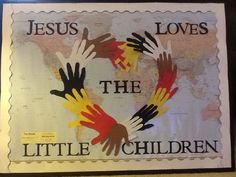 there is a sign that says jesus loves the little children with hands painted on it