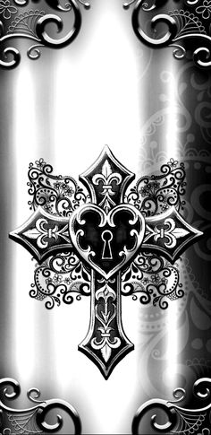 an ornate cross on a black and white background