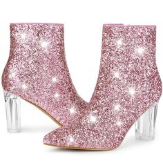 Hustle back to the disco era in this pointed-toe glitter boot lofted by a danceable heel. Sparkling gold and silver glitter give a celebratory vibe to this pretty ankle boot made with zip pull-tabs on the side. Glitter Ankle Boots; Clear Heels; Sparkle Glitter Boots; Pointy Toe; Chunky High Heel; Size Zipper. Vamp: Glitter; Outsole: Rubber; Heel: ABS; Heel Height: 3 1/3 inches; Shaft Height: 4 8/9 inches. Metallic Boots For Party In Fall, Metallic High Heel Boots For Party, Party Season Heeled Boots With Round Toe, Metallic Pointed Toe Boots For Party, Holiday Party Boots With Round Toe, Metallic High Heeled Boots For Party, Gold Boots For Party Season, Pointed Toe Boots For Party And Holiday, Glamorous Pointed Toe Heeled Boots For Party