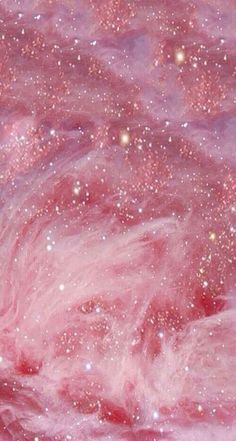 an image of pink and white stars in the sky