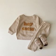 Get your little one dressed in style with this ultra-comfy jogger set. 😍 Made from cotton, it's perfect for those cool autumn days 🍂. The soft O-neck collar and pullover closure ensure a snug fit. Available in beige and khaki, this fashionable set is ideal for any age from 3 to 24 months. 🧶👶🏽 Specifications: Material: Cotton Fabric Type: Combed Cotton Sleeve Length: Long Fit: Fits true to size, take your normal size Season: Spring & Autumn Item Type: Sets Age Range: 3 - 36 months Gender: Ba Loose Trousers Outfit, Trouser Outfit, Cool Baby, Loose Trousers, Sweatpants Set, Boys Set, Tracksuit Set, Baby Set, Jogger Set